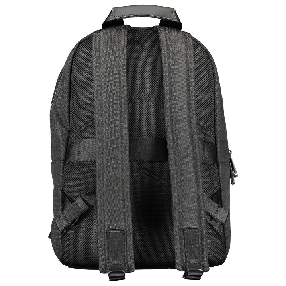 Backpack by Calvin Klein for men in polyester black features a refined silhouette, showcasing the Polyester Backpack design with a secure zipper, ample external-pockets, and versatile handle, backpack-strap & adjustable-strap.