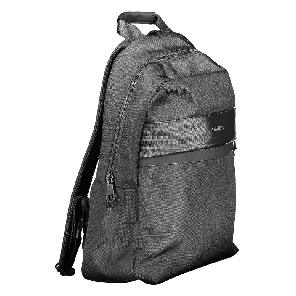 Backpack by Calvin Klein for men in polyester black showcases a stately Polyester Backpack design, featuring a secure zipper with stately external-pockets and versatile handle, backpack-strap & adjustable-strap.