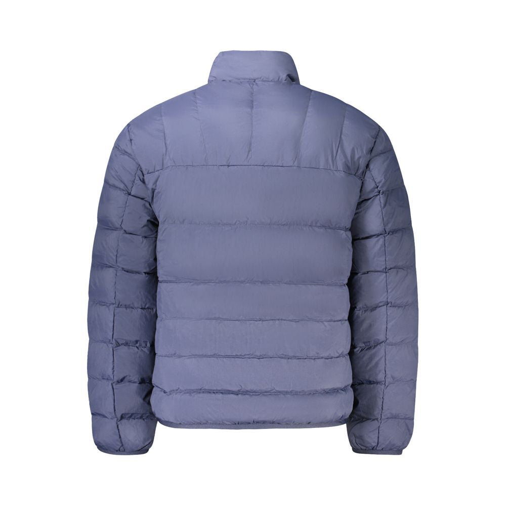 Overcoat by Tommy Hilfiger for men in nylon blue presents a luxurious silhouette, showcasing a luxurious and sophisticated pockets for a premium, luxurious look.