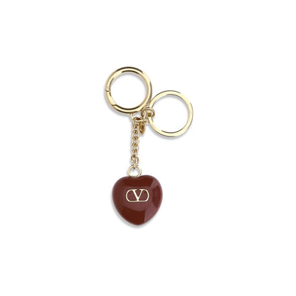 Keychain by Valentino Garavani for women in stretch polyamide brown, patterned & tartan features an sleek design, highlighting a sophisticated and refined for an sleek look.