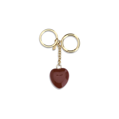 This Keychain by Valentino Garavani for women in stretch polyamide and brown, patterned & tartan showcases a couture-inspired aesthetic, meticulously highlighting the and with a finish.