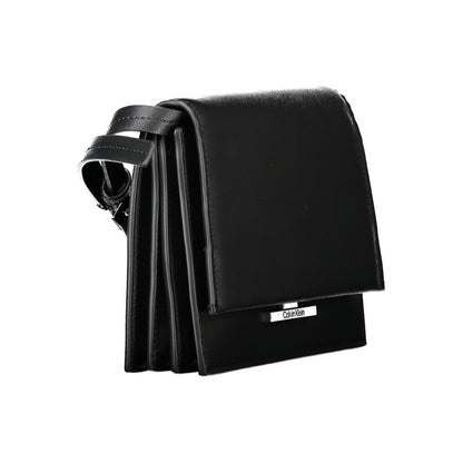 2-in-1 Shoulder & Crossbody Handbag by Calvin Klein for women in polyethylene faux leather black features an refined silhouette, showcasing a secure snap, ample built-in-compartments & internal-pockets, and versatile crossbody-strap, shoulder-strap & adjustable-strap for a sophisticated refined aesthetic.