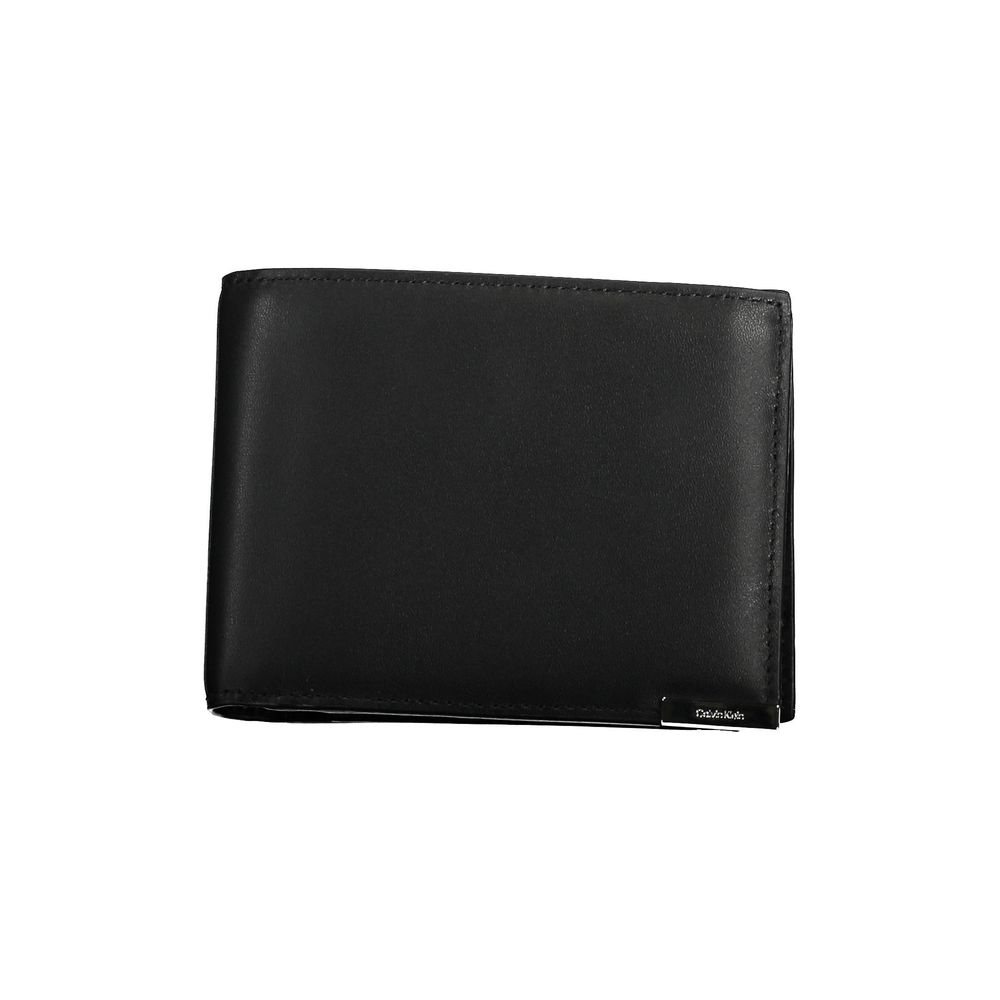 Wallet by Calvin Klein for men in leather black presents a architectural silhouette from the Leather Wallet collection, showcasing architectural rfid-protection coin-purse for a architectural finish.