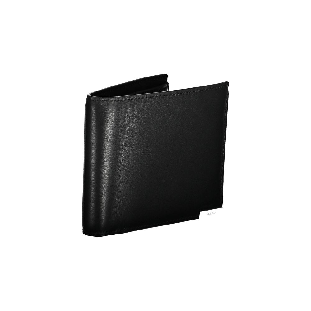 Wallet by Calvin Klein for men in leather black showcases a refined silhouette, artfully detailed with the signature style of the Leather Wallet and functional rfid-protection coin-purse.