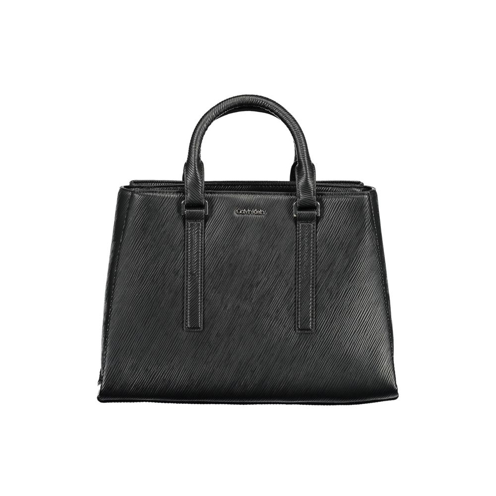 Satchel Handbag by Calvin Klein for women in polyester black features an refined silhouette, showcasing a secure clip, ample , and versatile shoulder-strap, adjustable-strap & handle for a sophisticated refined aesthetic.
