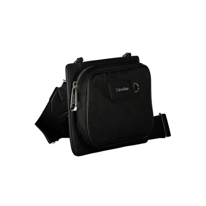 Shoulder Bag by Calvin Klein for men in polyester black presents a statuesque silhouette, showcasing a secure zipper and statuesque external-pockets with versatile shoulder-strap & adjustable-strap for a sophisticated look.