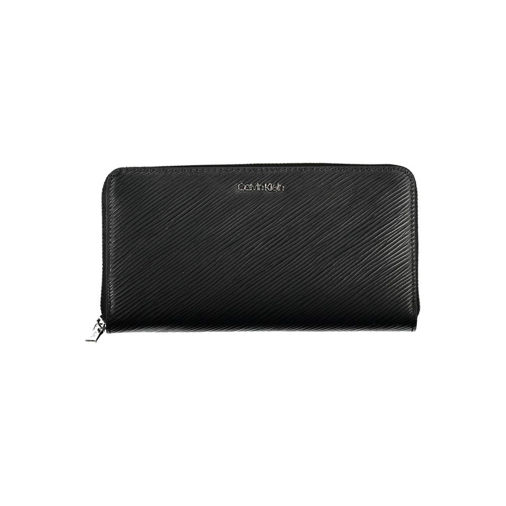 Wallet by Calvin Klein for women in polyethylene black presents a streamlined silhouette, showcasing the sophisticated design of the Polyethylene Wallet collection with functional rfid-protection coin-purse.