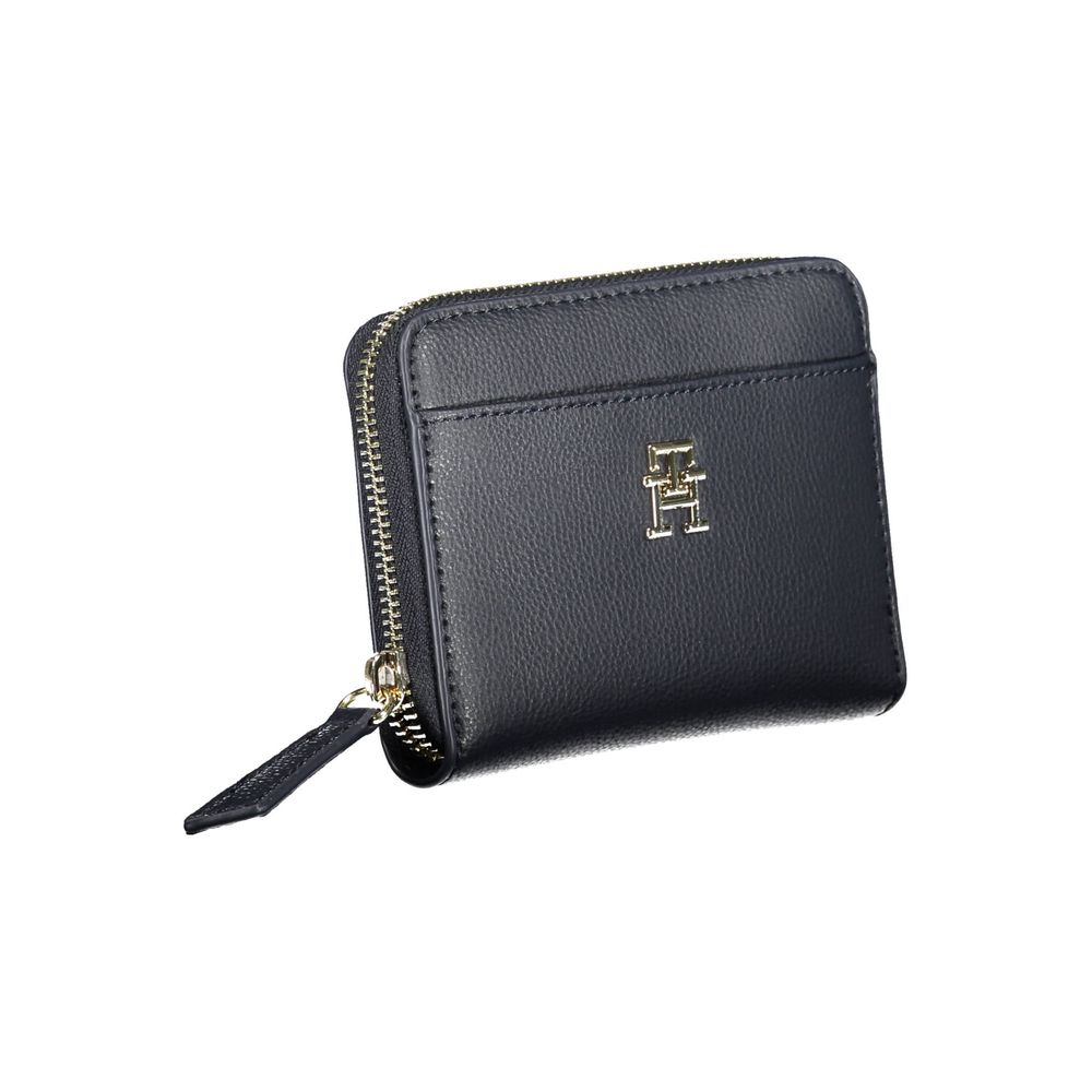 Wallet by Tommy Hilfiger for women in polyester blue showcases a discerning silhouette, artfully capturing the essence of Polyester Wallet with its functional coin-purse.
