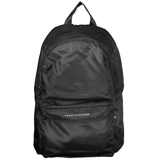 Backpack by Tommy Hilfiger for men in polyester black & print features a stately Polyester Backpack design, showcasing a secure zipper, ample built-in-compartments, external-pockets, internal-pockets & laptop-compartment, and versatile backpack-strap, adjustable-strap & handle for a stately finish.