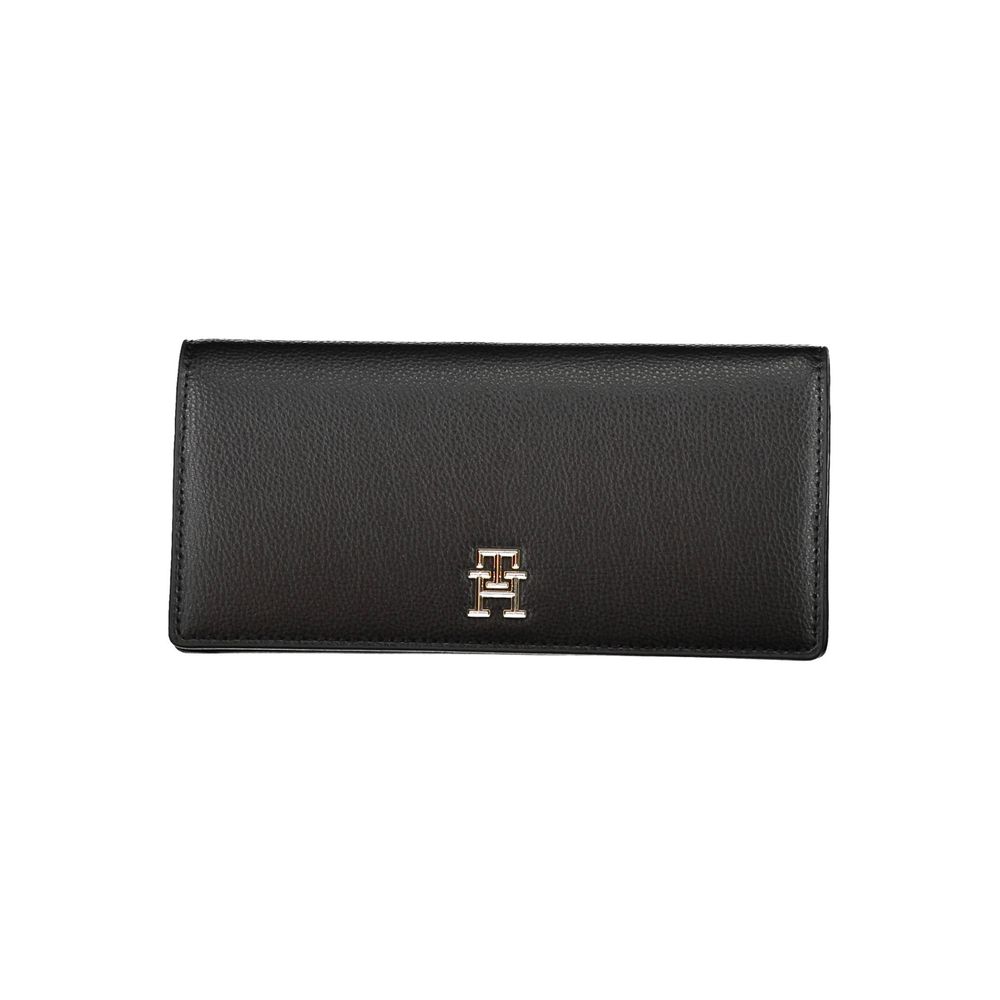 Wallet by Tommy Hilfiger for women in polyethylene black showcases a discerning silhouette, artfully capturing the essence of Polyethylene Wallet with its functional .
