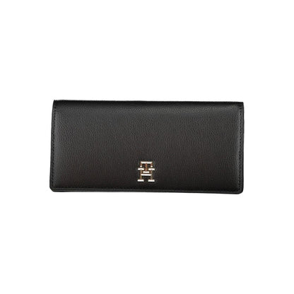 Wallet by Tommy Hilfiger for women in polyethylene black showcases a discerning silhouette, artfully capturing the essence of Polyethylene Wallet with its functional .