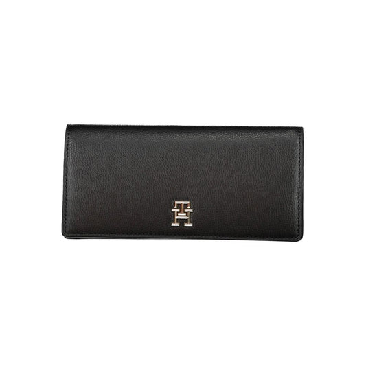 Wallet by Tommy Hilfiger for women in polyethylene black showcases a discerning silhouette, artfully capturing the essence of Polyethylene Wallet with its functional .