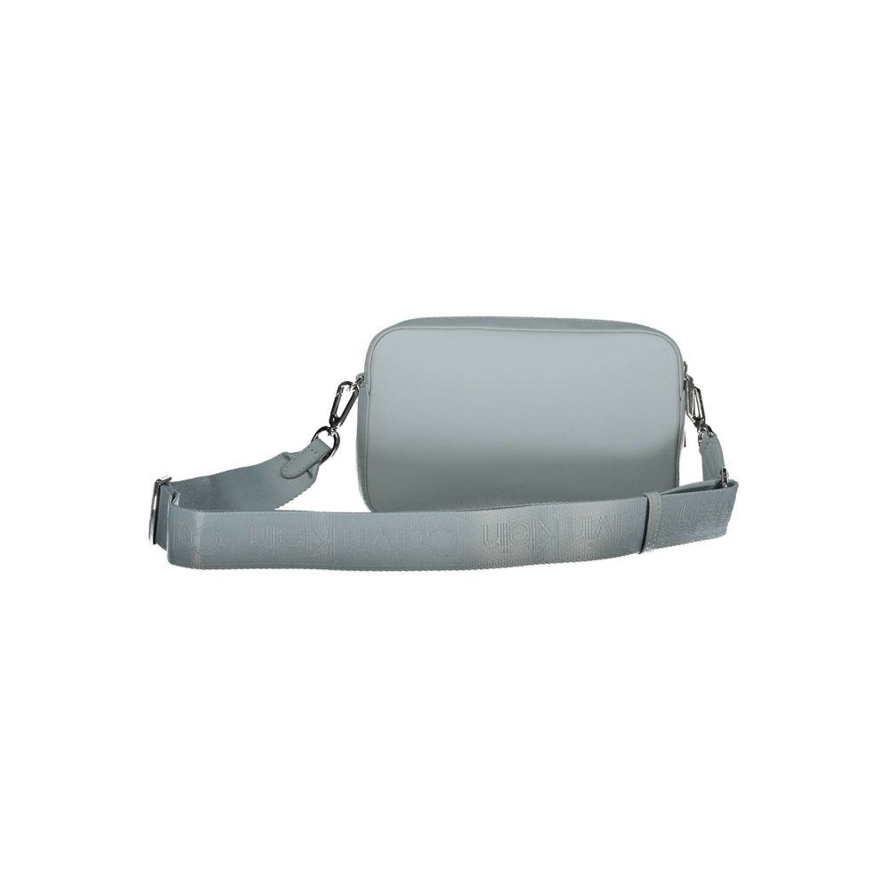Crossbody Handbag by Calvin Klein for women in polyester faux leather blue features a exquisite silhouette, showcasing a secure zipper and exquisite internal-pockets with versatile crossbody-strap & adjustable-strap for a exquisite finish.