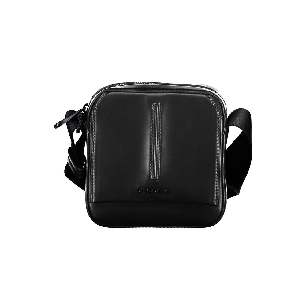 Shoulder Bag by Calvin Klein for men in polyester black features a effortless chic silhouette with a secure snap & zipper, ample external-pockets, and versatile shoulder-strap & adjustable-strap for a effortless chic finish.