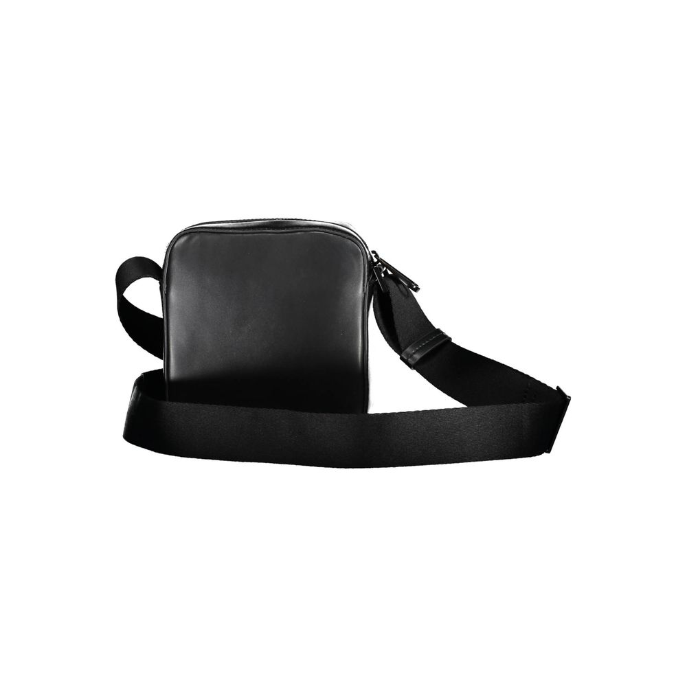 Shoulder Bag by Calvin Klein for men in polyester black features a effortless sophistication silhouette, secured by a snap & zipper with ample external-pockets and versatile shoulder-strap & adjustable-strap for a effortless sophistication finish.
