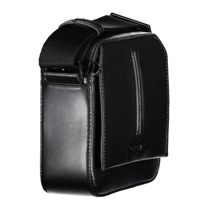 Shoulder Bag by Calvin Klein for men in polyester black showcases a statuesque silhouette, artfully detailed with a secure snap & zipper, organized external-pockets, and versatile shoulder-strap & adjustable-strap for a statuesque look.
