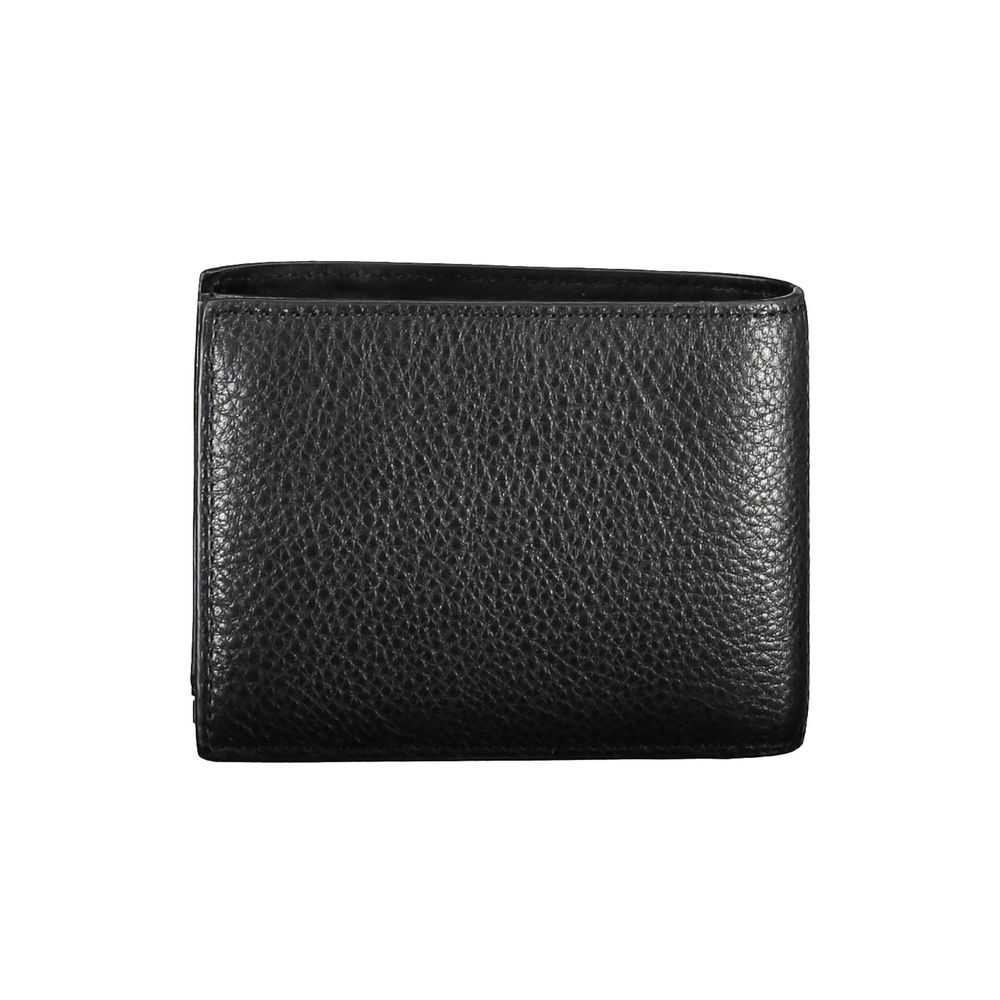 Wallet by Calvin Klein for men in leather black presents a refined silhouette, artfully capturing the essence of the Leather Wallet design with sophisticated rfid-protection for a refined look.
