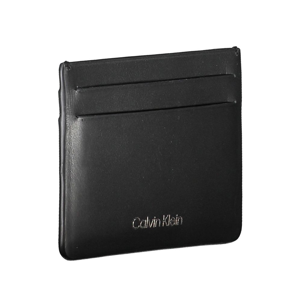 Cardholder Wallet by Calvin Klein for men in leather black & print presents a streamlined silhouette, showcasing the sophisticated design of the Leather Cardholder Wallet collection with functional card-organization.