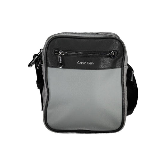 Shoulder Bag by Calvin Klein for men in polyester gray presents a statuesque silhouette, showcasing a secure zipper and statuesque external-pockets & internal-pockets with versatile shoulder-strap & adjustable-strap for a sophisticated look.