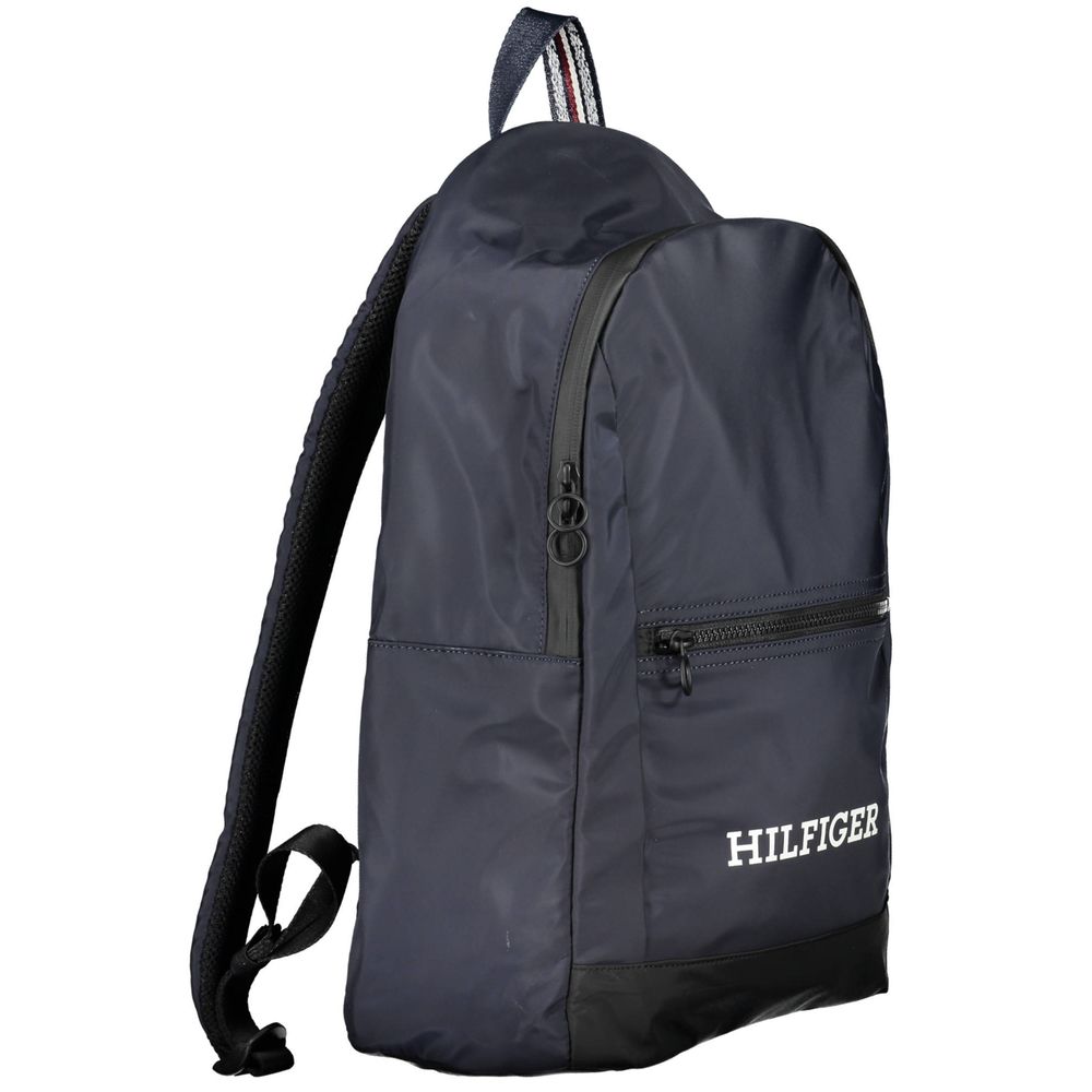 Backpack by Tommy Hilfiger for men in polyester blue & print features a architectural Polyester Backpack design with a secure zipper, ample external-pockets & laptop-compartment, and versatile handle, backpack-strap & adjustable-strap for a architectural finish.