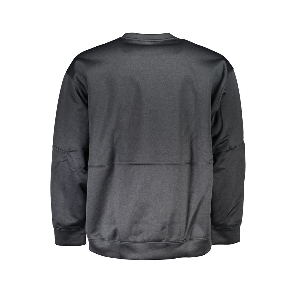 Sweater by Calvin Klein for men in polyester black showcases a downtown chic silhouette, artfully finished with a downtown chic crew neckline and for a sophisticated, high-end look.