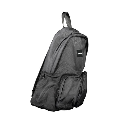 Backpack by Calvin Klein for men in polyester black features a architectural Polyester Backpack design with a secure zipper, ample external-pockets, internal-pockets & laptop-compartment, and versatile handle, backpack-strap & adjustable-strap for a architectural finish.