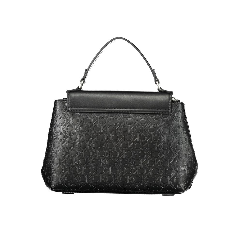Shopper Handbag by Calvin Klein for women in polyester embossed faux leather black presents a ornamental silhouette, showcasing a secure zipper, ample internal-pockets, and versatile shoulder-strap, adjustable-strap & handle for a ornamental finish.