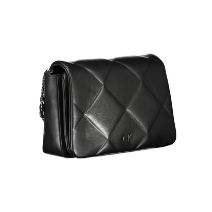 Crossbody Quilted Handbag by Calvin Klein for women in polyester faux leather black features a ornamental silhouette, showcasing a secure zipper & magnetic, ample internal-pockets, and ornamental crossbody-strap & adjustable-strap for a sophisticated look.