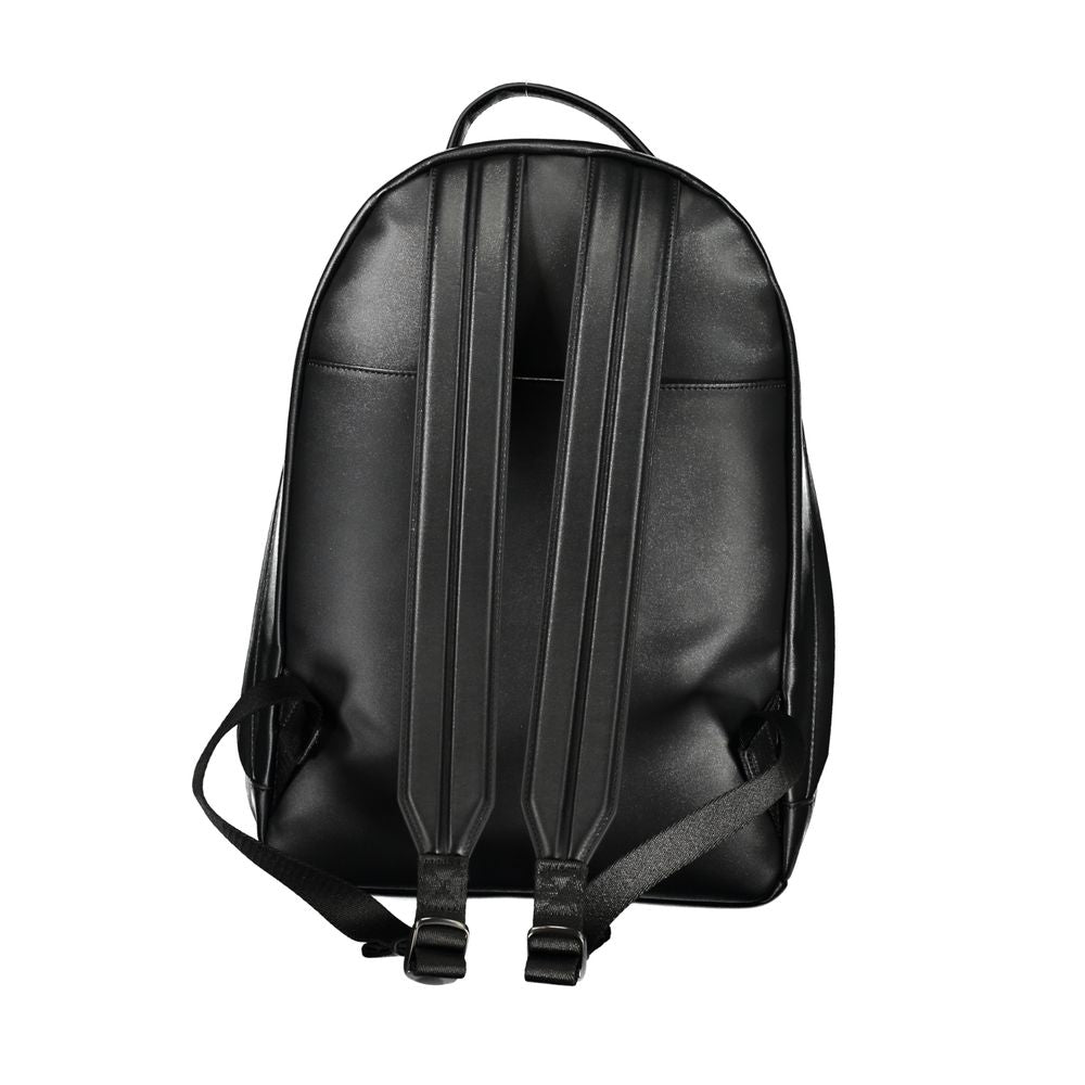 Backpack by Calvin Klein for men in polyester black showcases an architectural Polyester Backpack design, featuring a secure zipper, ample external-pockets, internal-pockets & laptop-compartment, and architectural handle, backpack-strap & adjustable-strap for a sophisticated look.