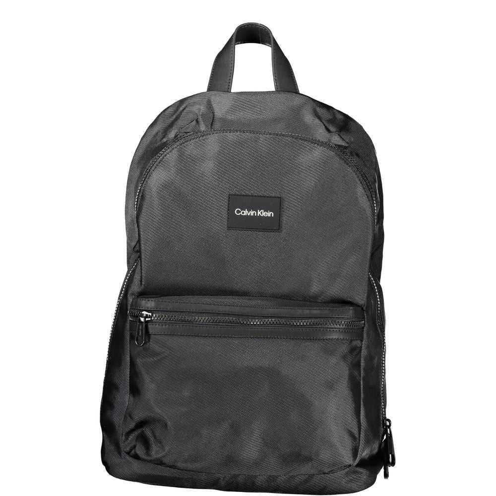 Backpack by Calvin Klein for men in polyester black features an stately silhouette from the Polyester Backpack range, with a secure zipper, ample external-pockets, internal-pockets & laptop-compartment, and versatile backpack-strap, adjustable-strap & handle.