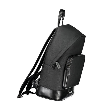 Backpack by Calvin Klein for men in polyester black showcases an architectural Polyester Backpack design, featuring a secure zipper, ample external-pockets, internal-pockets & laptop-compartment, and architectural backpack-strap, adjustable-strap & handle for a sophisticated look.