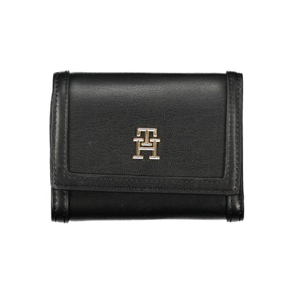 Wallet by Tommy Hilfiger for women in polyethylene black showcases a refined silhouette, artfully detailed with the signature style of the Polyethylene Wallet and functional coin-purse.