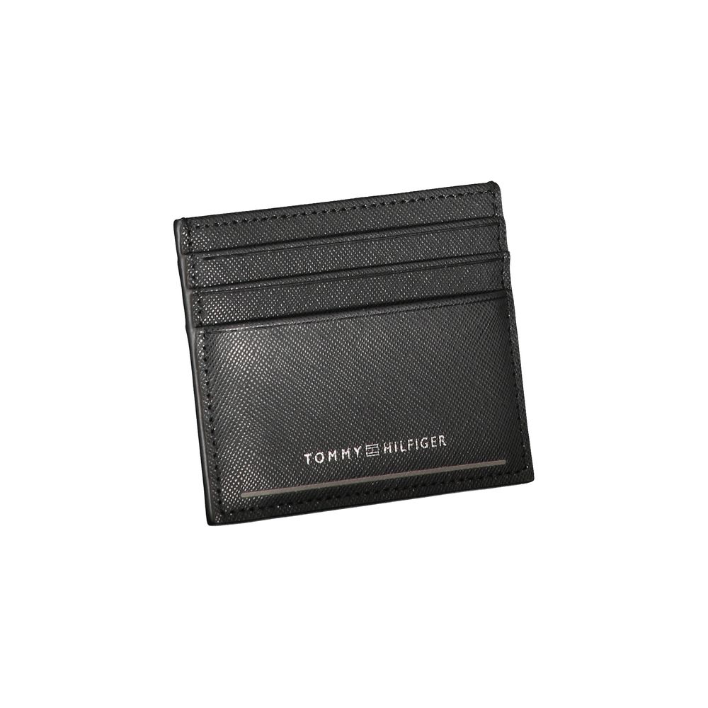 Cardholder Wallet by Tommy Hilfiger for men in leather black showcases a discerning silhouette, artfully capturing the essence of Leather Cardholder Wallet with its functional card-organization.