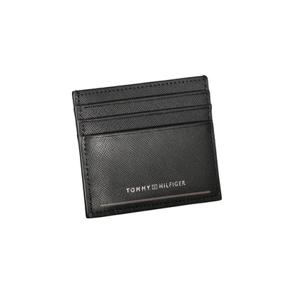 Cardholder Wallet by Tommy Hilfiger for men in leather black showcases a discerning silhouette, artfully capturing the essence of Leather Cardholder Wallet with its functional card-organization.