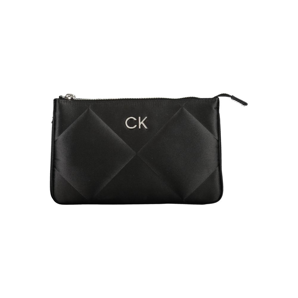 Quilted Shoulder Handbag by Calvin Klein for women in polyester black features a signature silhouette, showcasing a secure zipper and signature built-in-compartments & cardholder with versatile shoulder-strap & adjustable-strap for a sophisticated look.