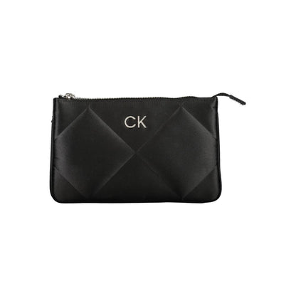 Quilted Shoulder Handbag by Calvin Klein for women in polyester black features a signature silhouette, showcasing a secure zipper and signature built-in-compartments & cardholder with versatile shoulder-strap & adjustable-strap for a sophisticated look.