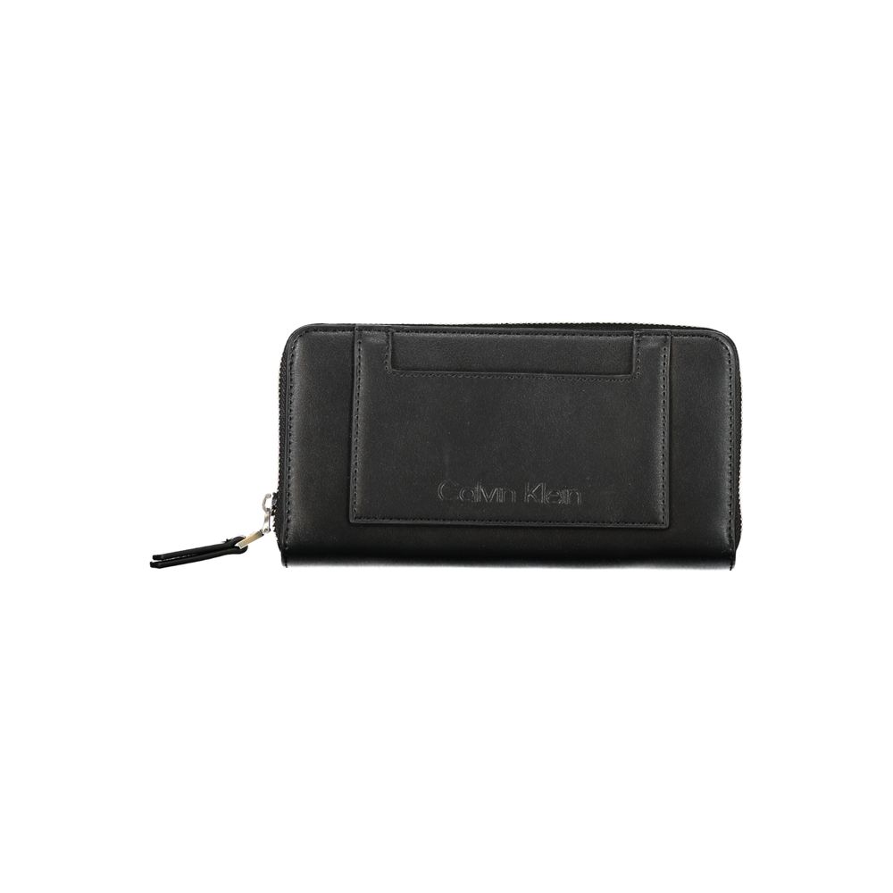 Wallet by Calvin Klein for women in polyester black showcases a refined silhouette, artfully detailed with the signature style of the Polyester Wallet and functional coin-purse.