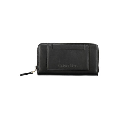 Wallet by Calvin Klein for women in polyester black showcases a refined silhouette, artfully detailed with the signature style of the Polyester Wallet and functional coin-purse.