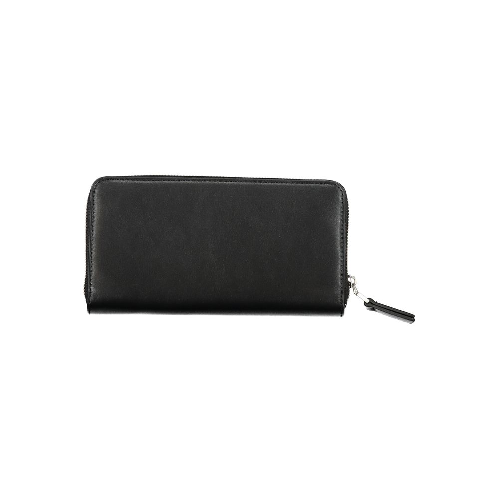 Wallet by Calvin Klein for women in polyester black presents a architectural silhouette from the Polyester Wallet collection, showcasing architectural coin-purse for a architectural finish.