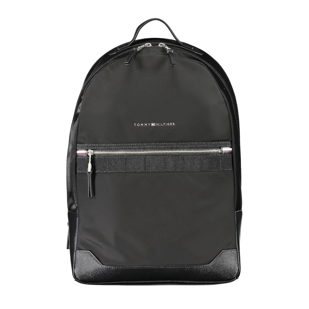 Backpack by Tommy Hilfiger for men in polyester black presents a stately Polyester Backpack design, showcasing a secure zipper with ample external-pockets & laptop-compartment and versatile handle, backpack-strap & adjustable-strap for a stately finish.
