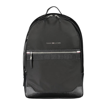 Backpack by Tommy Hilfiger for men in polyester black presents a stately Polyester Backpack design, showcasing a secure zipper with ample external-pockets & laptop-compartment and versatile handle, backpack-strap & adjustable-strap for a stately finish.