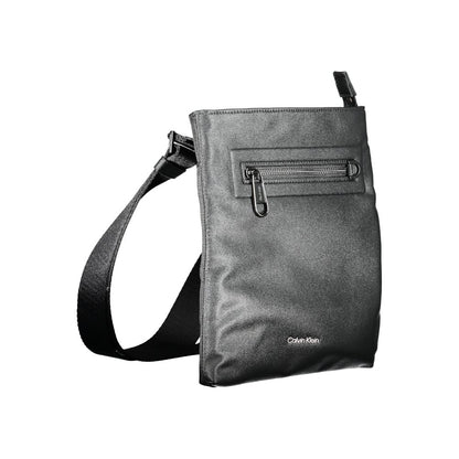 Shoulder Bag by Calvin Klein for men in polyester black & signature features a statuesque silhouette, showcasing a secure zipper and statuesque external-pockets & internal-pockets with versatile shoulder-strap & adjustable-strap for a statuesque finish.