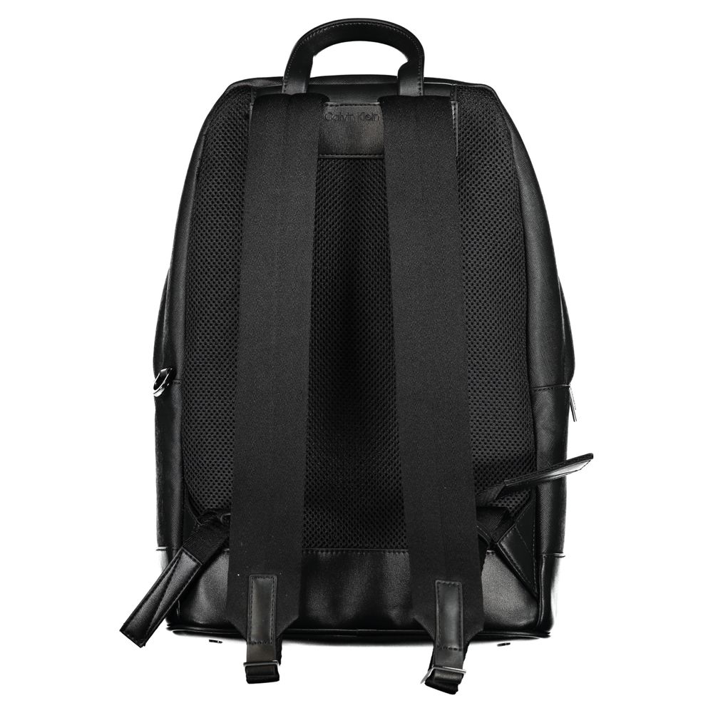 Backpack by Calvin Klein for men in polyester black features a stately Polyester Backpack design, showcasing a secure zipper, ample external-pockets, internal-pockets & laptop-compartment, and versatile backpack-strap, adjustable-strap & handle for a stately finish.