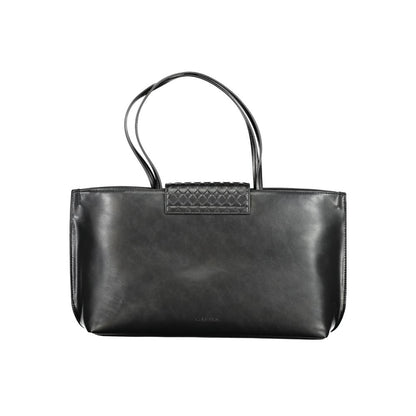 Tote Convertible Handbag by Calvin Klein for women in polyester faux leather black presents a exquisite silhouette, showcasing a secure magnetic and organized internal-pockets with versatile handle.