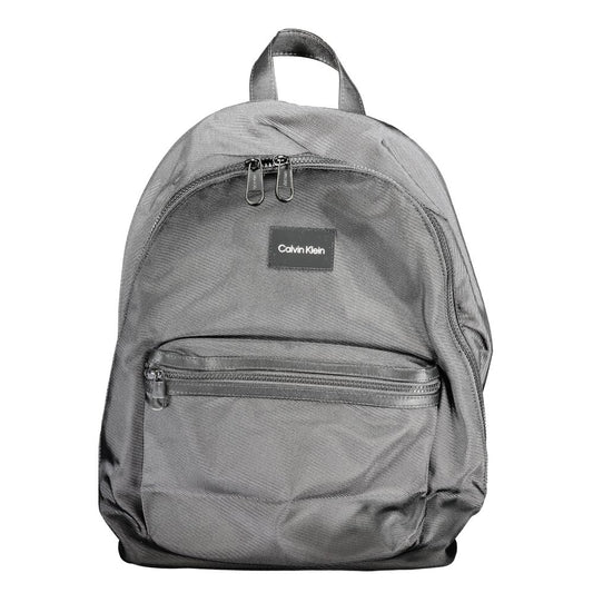 Backpack by Calvin Klein for men in polyester black features a stately Polyester Backpack design, showcasing a secure zipper, ample external-pockets, internal-pockets & laptop-compartment, and versatile backpack-strap, adjustable-strap & handle for a stately finish.