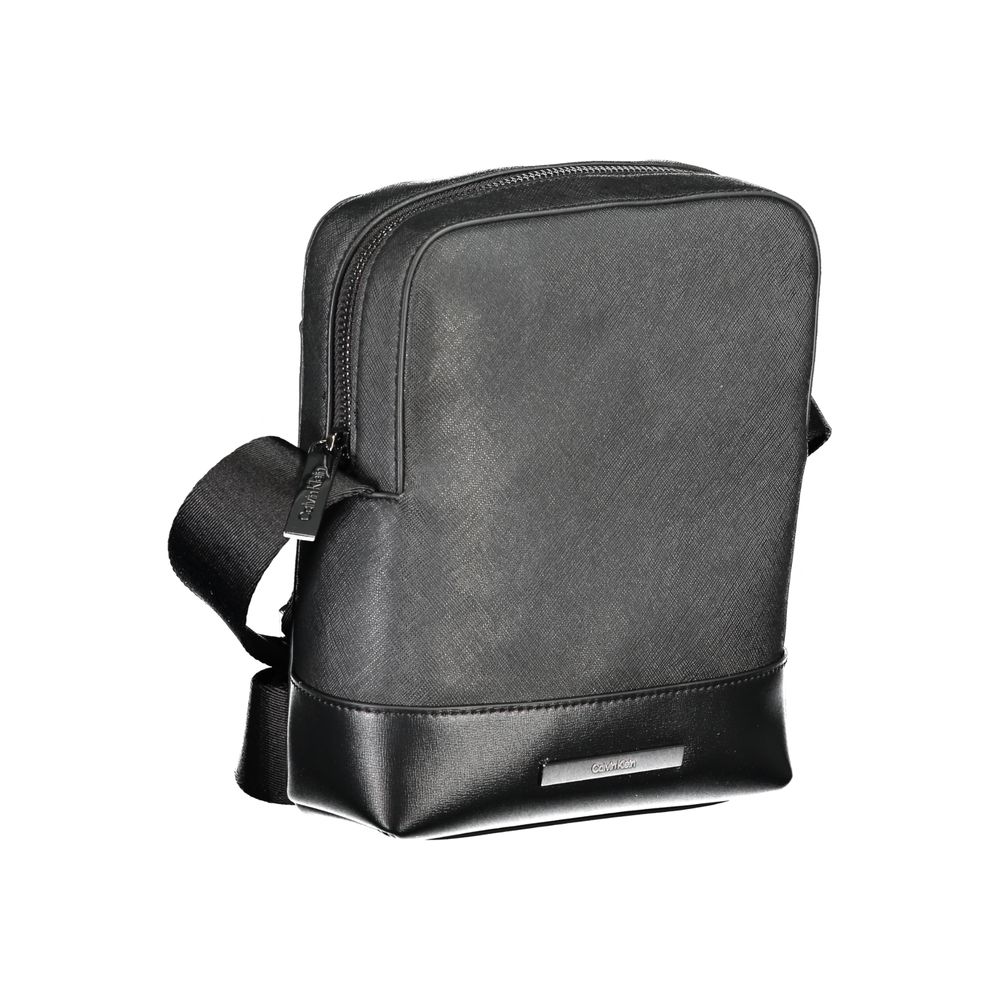 Shoulder Bag by Calvin Klein for men in polyester black features a stately silhouette, showcasing a secure zipper, ample external-pockets & internal-pockets, and stately shoulder-strap & adjustable-strap for a stately finish.