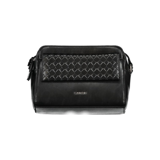 Crossbody Convertible Handbag by Calvin Klein for women in polyester faux leather black features an exquisite silhouette, showcasing a secure zipper & magnetic, ample external-pockets & cardholder, and exquisite crossbody-strap & adjustable-strap for a sophisticated finish.