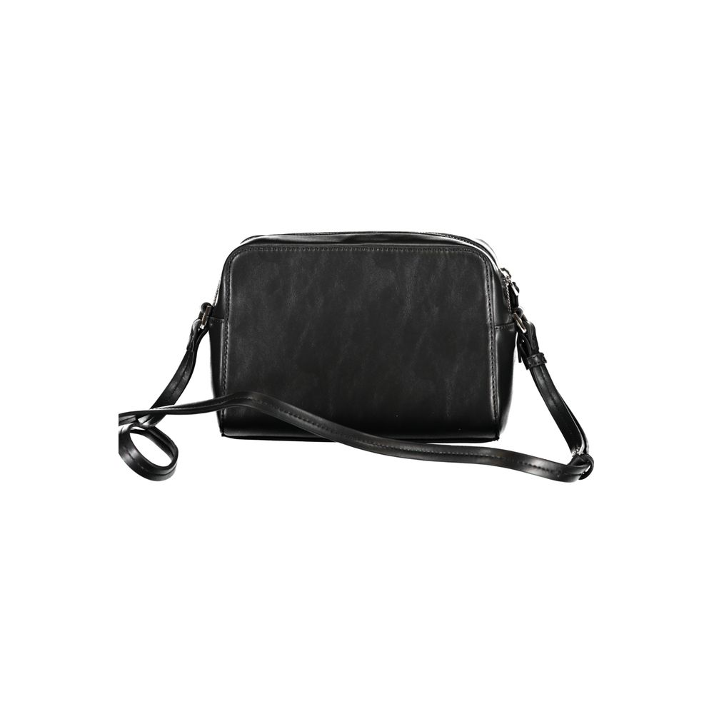 Crossbody Convertible Handbag by Calvin Klein for women in polyester faux leather black features an exquisite silhouette, showcasing a secure zipper & magnetic, ample external-pockets & cardholder, and versatile crossbody-strap & adjustable-strap for exquisite style.