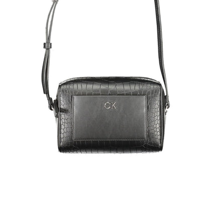 Crossbody Handbag by Calvin Klein for women in polyester embossed faux leather black presents a ornamental silhouette, showcasing a secure zipper, ample external-pockets & cardholder, and versatile crossbody-strap & adjustable-strap for a ornamental finish.