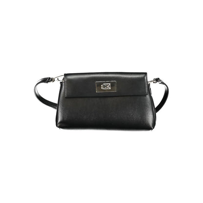 Convertible Handbag by Calvin Klein for women in polyester faux leather black features a polished silhouette with a secure snap, ample internal-pockets, and polished shoulder-strap & adjustable-strap for a sophisticated look.